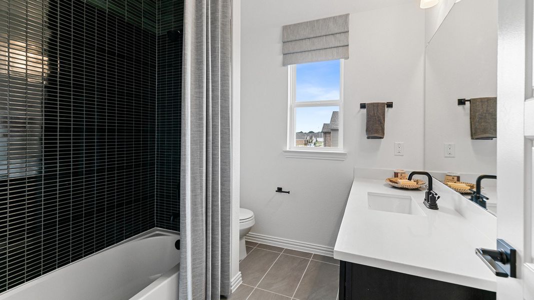 Representative furnished interior of a home built from the Magnolia by DRB Homes in Azalea, Pattison (Image 24).
