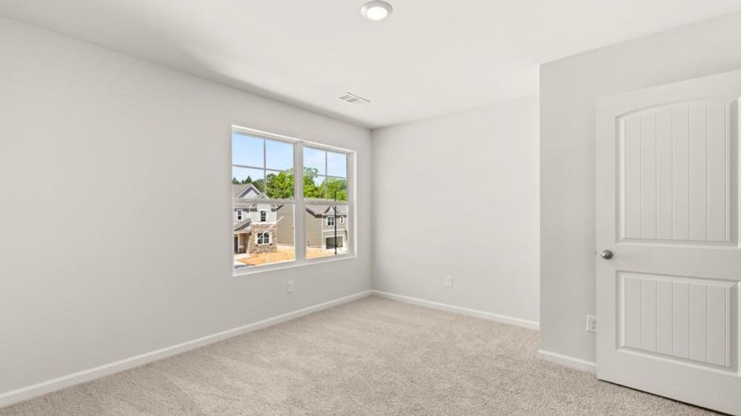 Spacious, unfurnished interior of a new home in Parkside at Carter Grove, Cartersville (Image 31).