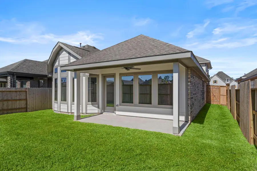 Exterior details and patio area of a home in Grand Central Park, Conroe (Image 4). Exterior details and patio area of a home in Grand Central Park, Conroe (Image 4).