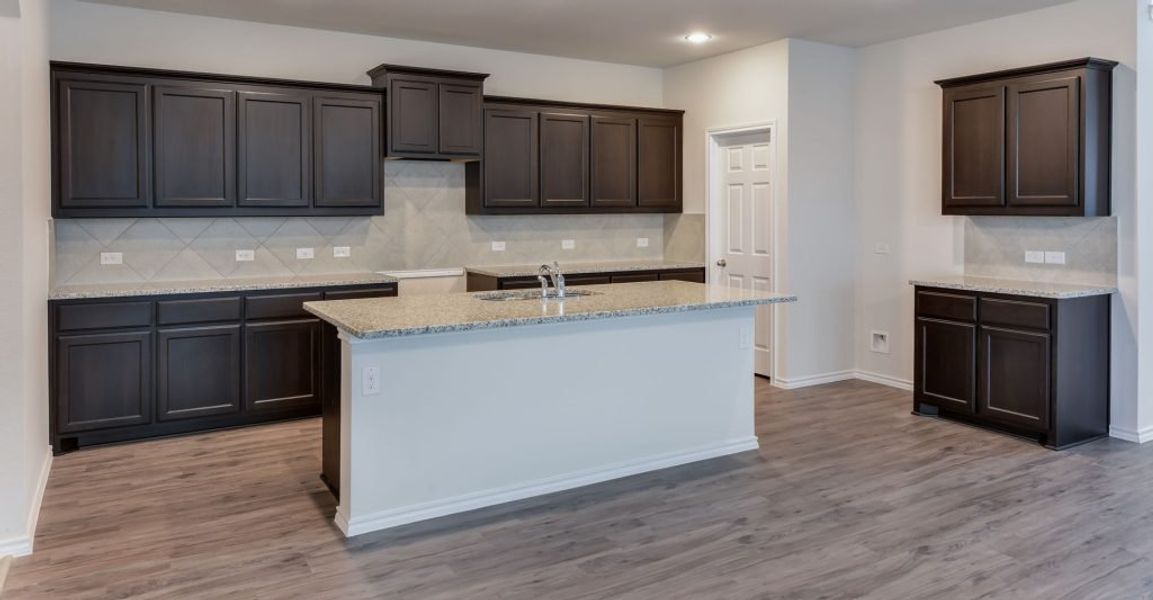 Representative exterior photo of a completed home built from the Adina by Impression Homes in Heartland, Heartland, TX (Image 8). Representative exterior photo of a completed home built from the Adina by Impression Homes in Heartland, Heartland, TX (Image 8).