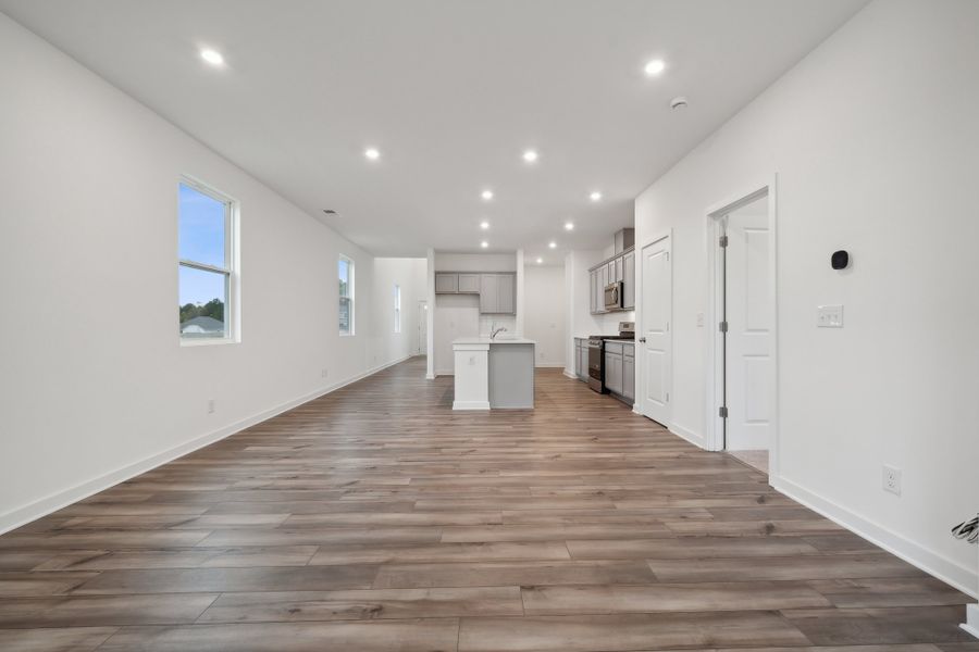 A long hallway with white walls. A long hallway with white walls.