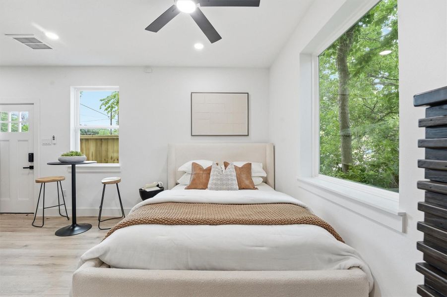 The theme of an abundance of windows allowing significant natural light continues in this space as well.