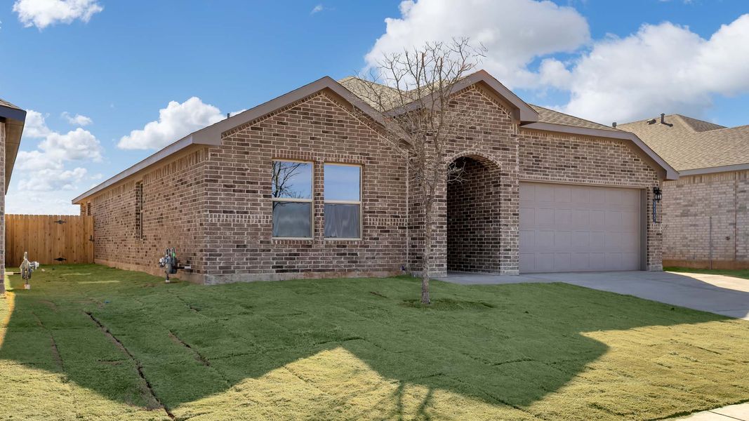 Representative exterior photo of a completed home built from the The Bentworth by D.R. Horton in Viridian, Lubbock, TX (Image 2).
