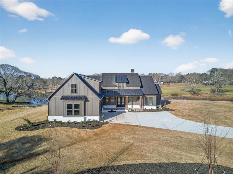 Front exterior of a new home in , Dallas, GA, highlighting curb appeal (Image 22).