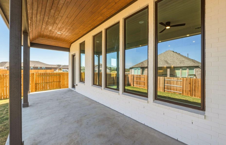 Exterior details and patio area of a home in 6 Creeks, Kyle (Image 3).