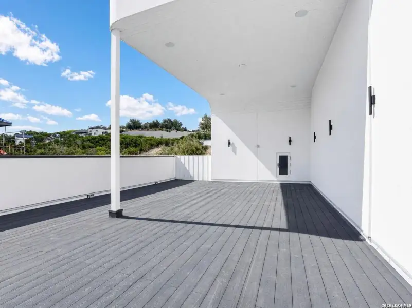Exterior details and patio area of a home in , San Antonio (Image 40).