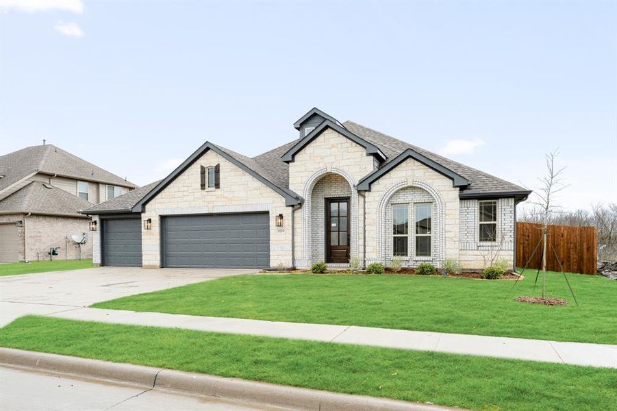 Front exterior of a new home in Waverly Estates, Nevada, TX, highlighting curb appeal (Image 25).