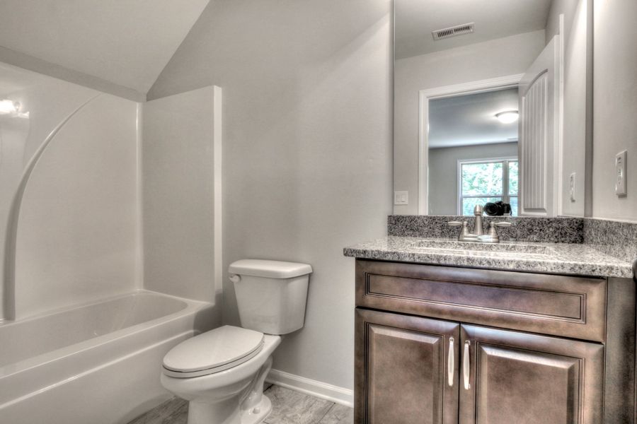 Representative furnished interior of a home built from the The Huntleigh by Bamford and Company in Rowland Springs, Cartersville (Image 12).