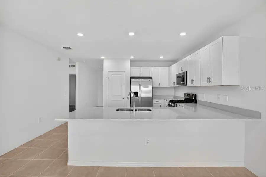Furnished interior view inside a new home in Firethorn, Parrish (Image 9).
