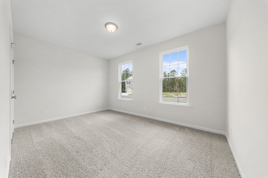 Representative unfurnished interior of a home built from the The Madison by Smith Family Homes in Camden Crossing, Savannah (Image 26).