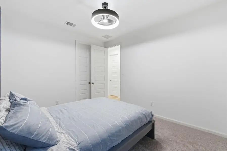 Furnished interior view inside a new home in Meridiana 40'/45', Manvel (Image 12).