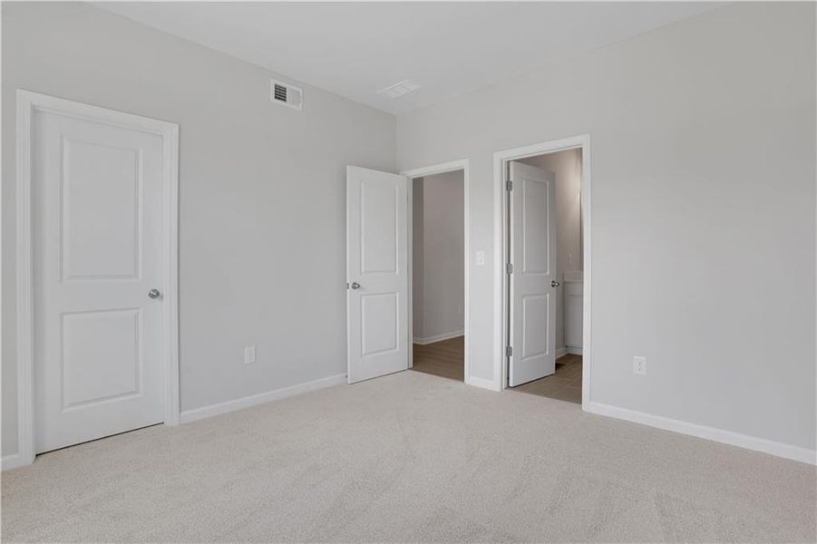 Spacious, unfurnished interior of a new home in The Paddocks at Doc Hughes, Buford (Image 45).
