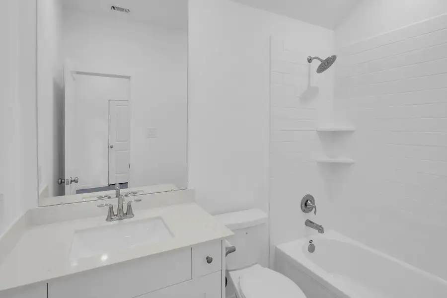 Furnished interior view inside a new home in Windrose Green: Bristol Collection, Angleton (Image 6).