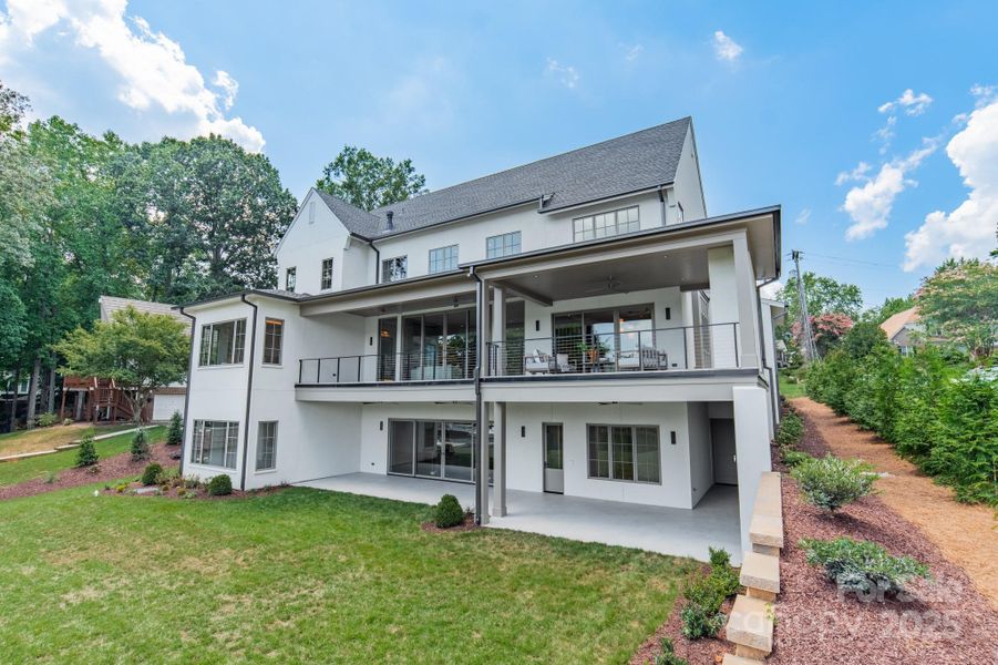 Front exterior of a new home in , Cornelius, NC, highlighting curb appeal (Image 1).
