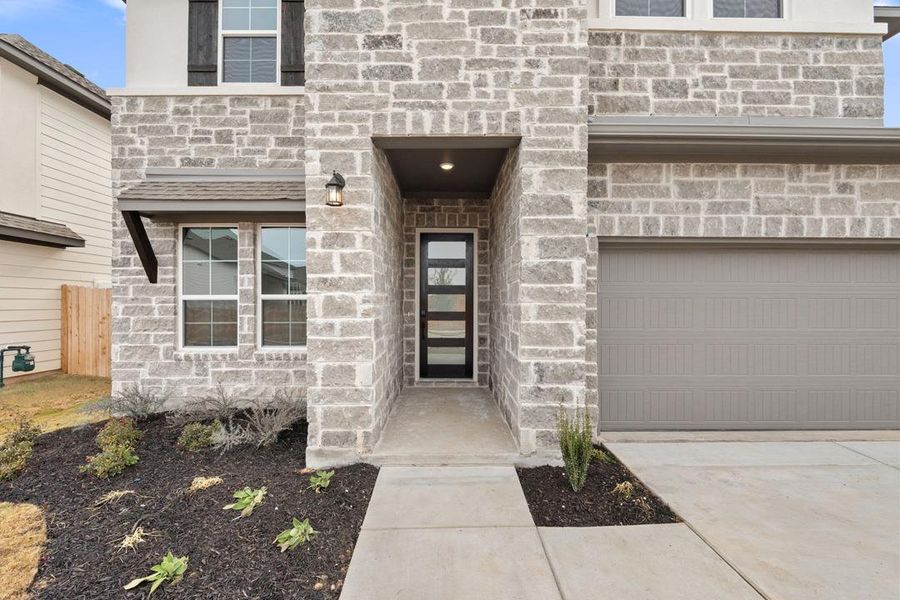 Exterior details and patio area of a home in Lagos Reserve, Manor (Image 3).