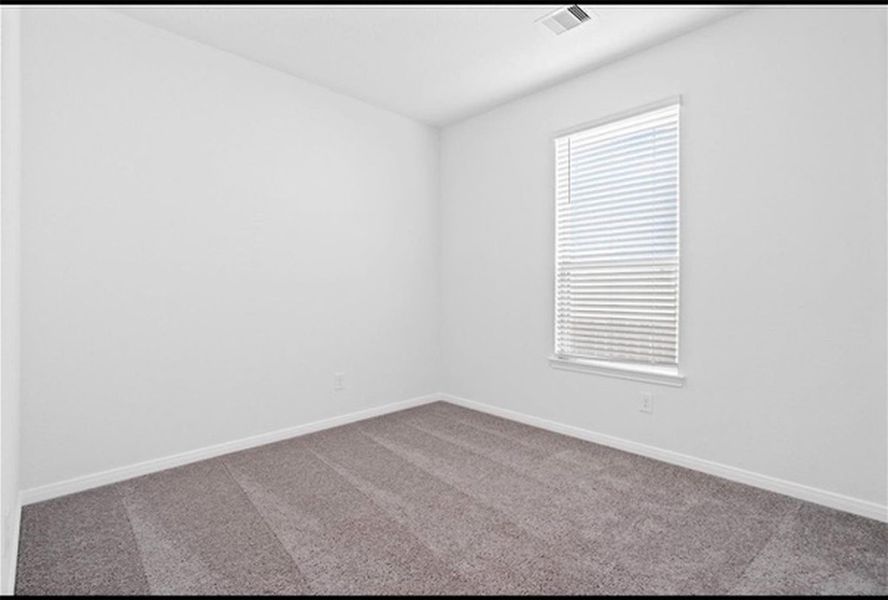 Spacious, unfurnished interior of a new home in Sunterra, Katy (Image 13).