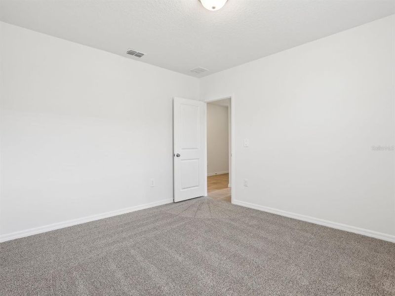 Spacious, unfurnished interior of a new home in The Reserve at Van Oaks, Auburndale (Image 31).