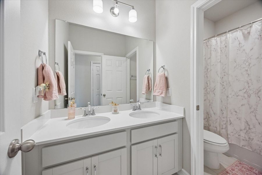 Furnished interior view inside a new home in Westland Ranch, League City (Image 27).