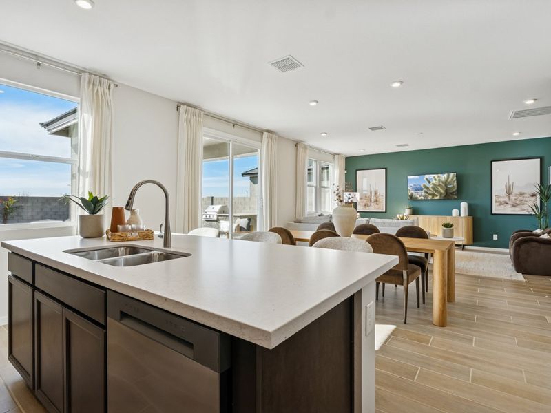 A kitchen with a large island. A kitchen with a large island.