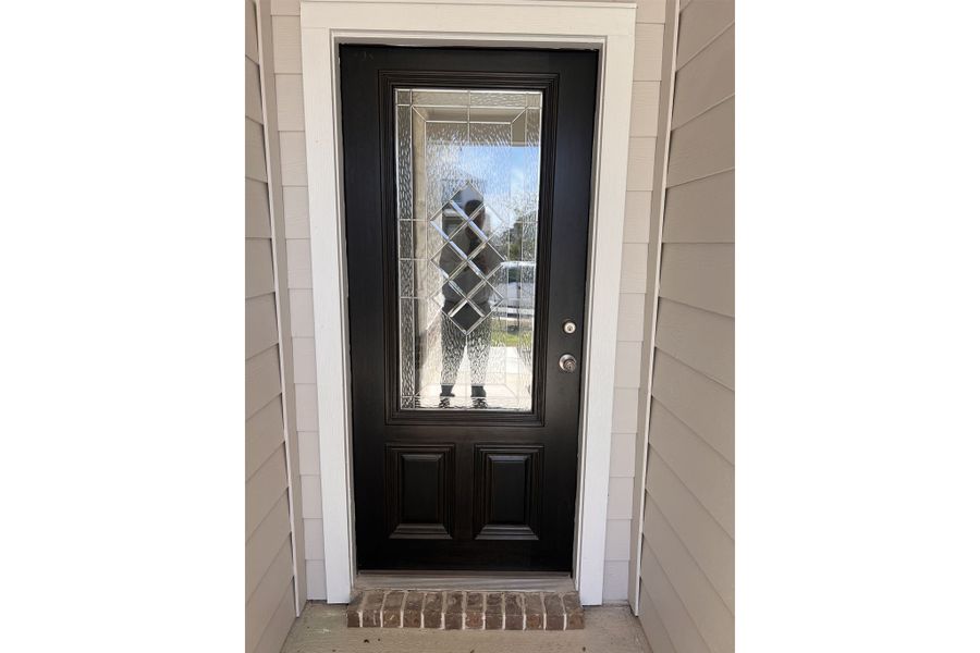 Exterior details and patio area of a home in Hunter's Ranch, San Antonio (Image 2).
