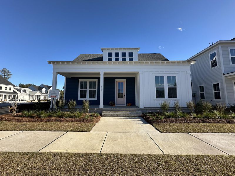 Front exterior of a new home in Nexton, Summerville, SC, highlighting curb appeal (Image 2).