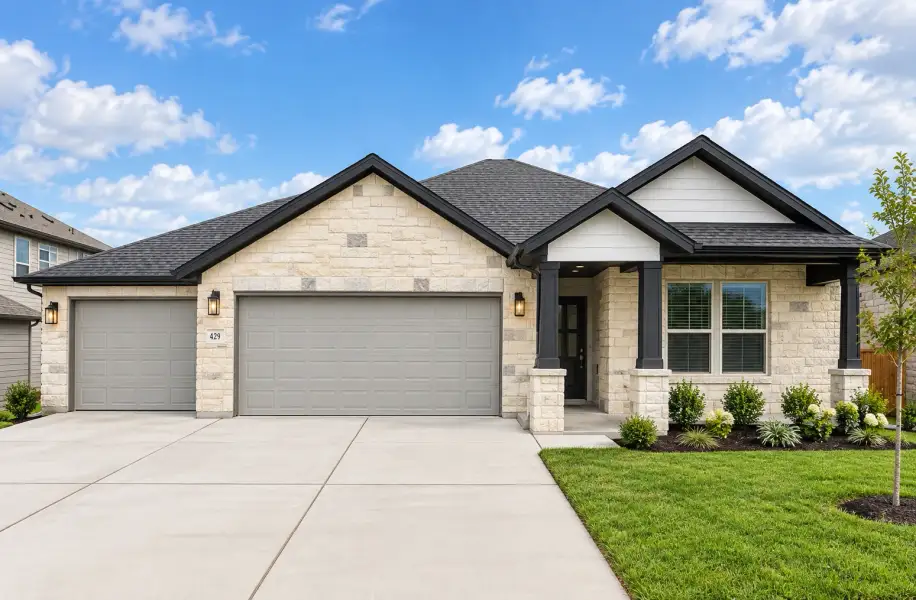 Front exterior of a new home in Crosswinds, Kyle, TX, highlighting curb appeal (Image 1). Front exterior of a new home in Crosswinds, Kyle, TX, highlighting curb appeal (Image 1).