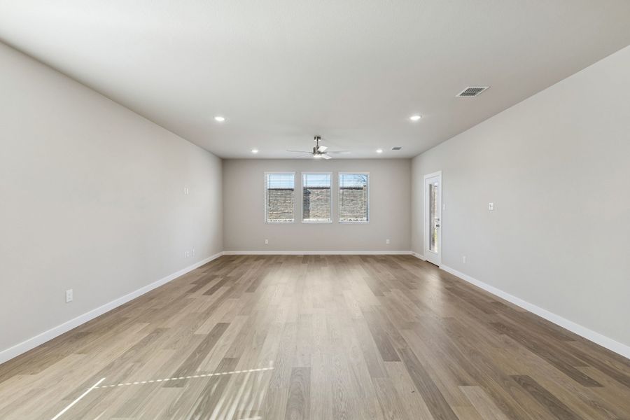 Living and Dining Room in the Holden home plan by Trophy Signature Homes – REPRESENTATIVE PHOTO Living and Dining Room in the Holden home plan by Trophy Signature Homes – REPRESENTATIVE PHOTO