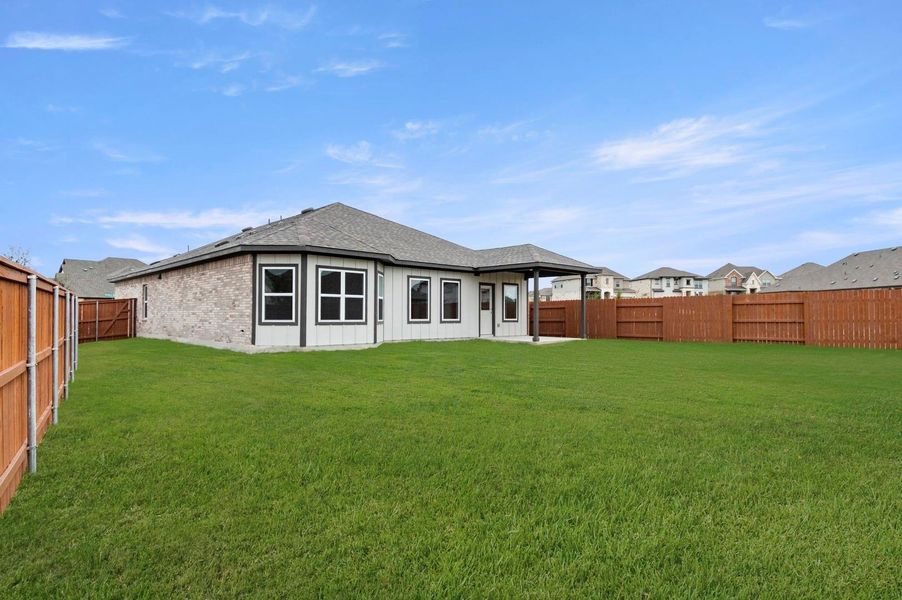 Exterior details and patio area of a home in Oaks at San Gabriel, Georgetown (Image 4).