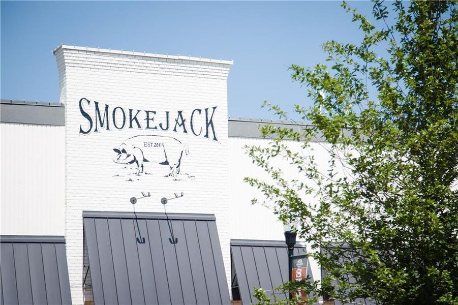 Front exterior of a new home in Byers Park, Alpharetta, GA, highlighting curb appeal (Image 24).