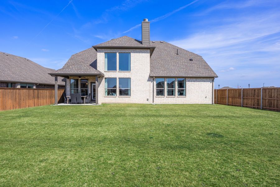 Exterior details and patio area of a home in Silo Mills, Joshua (Image 3).