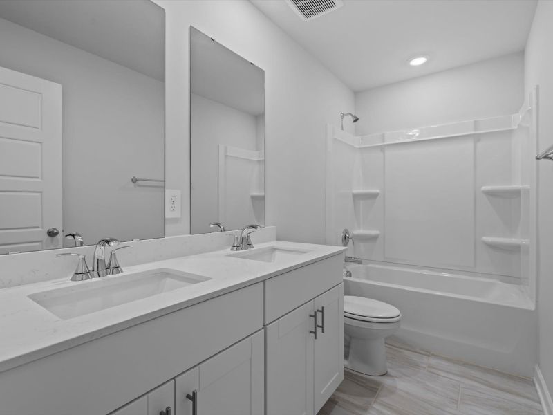 Furnished interior view inside a new home in Chatham Forest, Duncan (Image 8).