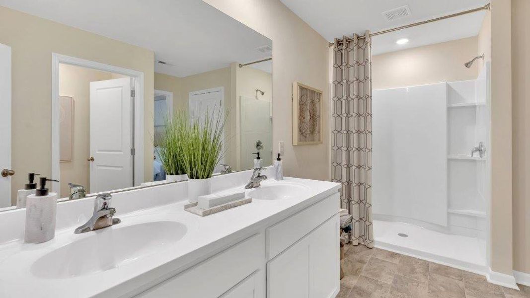 Furnished interior view inside a new home in The Hideaway at Fox Meadows, Bluff City (Image 16).