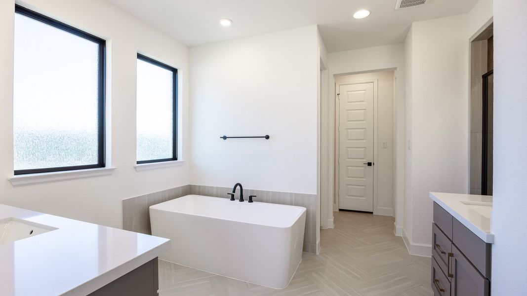 Furnished interior view inside a new home in Wolf Ranch 56', Georgetown (Image 6).