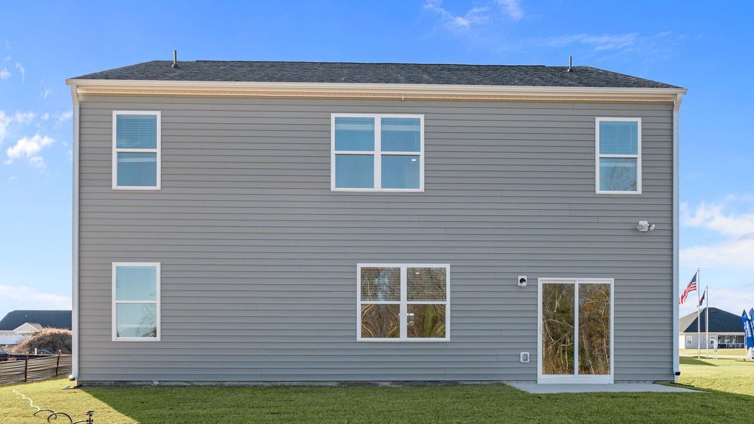 Exterior details and patio area of a home in Villa Grande, Winterville (Image 25).