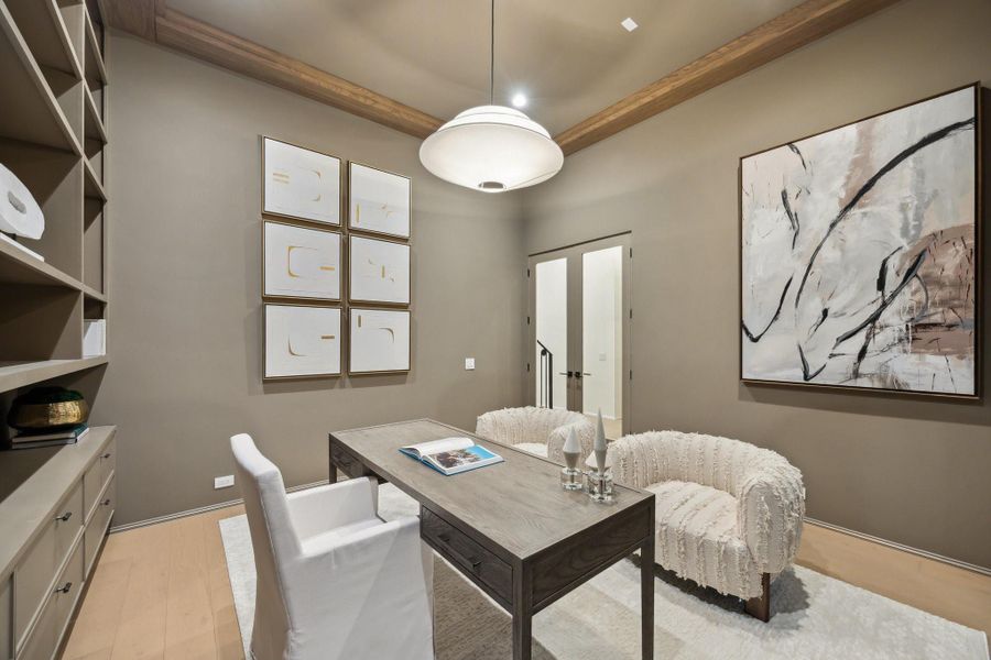 Another view of the Library which also features a set of clear glass doors. Another view of the Library which also features a set of clear glass doors.