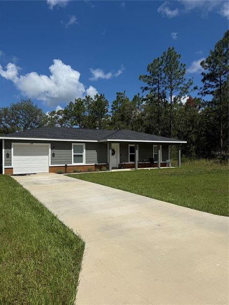 Front exterior of a new home in , Ocala, FL, highlighting curb appeal (Image 20). Front exterior of a new home in , Ocala, FL, highlighting curb appeal (Image 20).