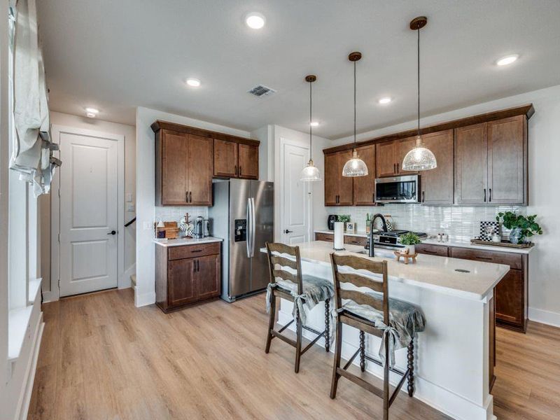 Furnished interior view inside a new home in Terrace Collection at Harvest, Argyle (Image 10).