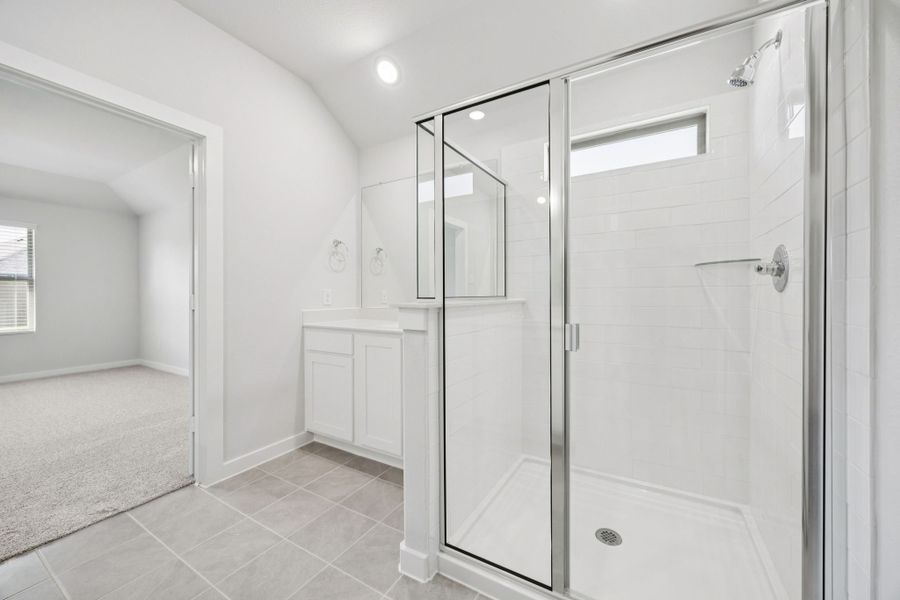 Primary Bathroom in the Heisman home plan by Trophy Signature Homes – REPRESENTATIVE PHOTO Primary Bathroom in the Heisman home plan by Trophy Signature Homes – REPRESENTATIVE PHOTO