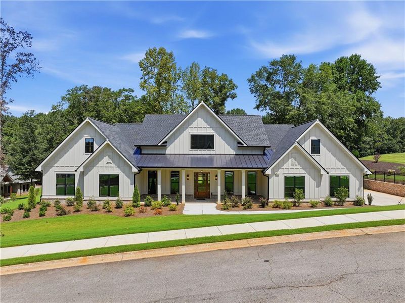 Front exterior of a new home in , Commerce, GA, highlighting curb appeal (Image 1). Front exterior of a new home in , Commerce, GA, highlighting curb appeal (Image 1).