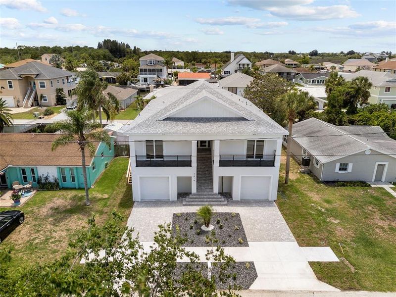 Front exterior of a new home in , Hudson, FL, highlighting curb appeal (Image 15).