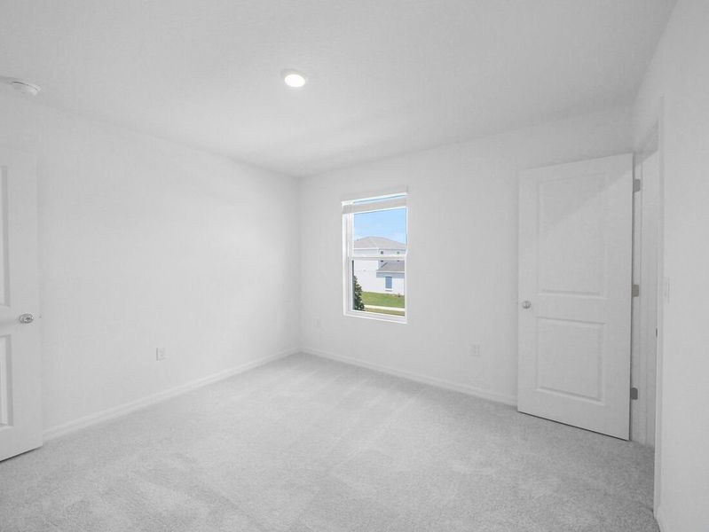 Representative unfurnished interior of a home built from the Azalea by Taylor Morrison in Waterstone, Groveland (Image 37).