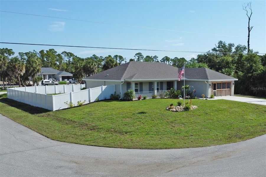 Exterior details and patio area of a home in , North Port (Image 29).
