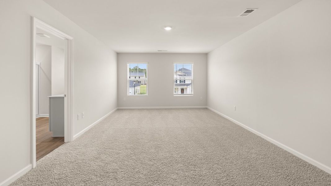 Spacious, unfurnished interior of a new home in Preserve at Dove Creek, Statham (Image 18).