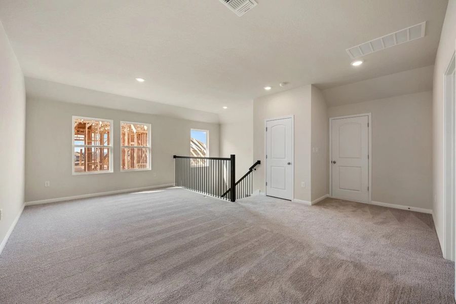Spacious, unfurnished interior of a new home in The Colony, Bastrop (Image 36).