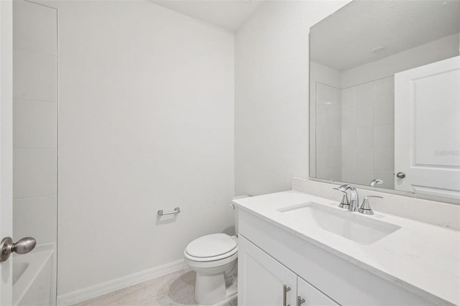 Furnished interior view inside a new home in Ridgehaven - Villas, Ormond Beach (Image 9).