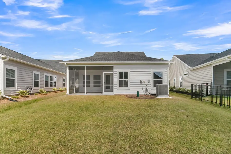 Exterior details and patio area of a home in Horizons at Summers Corner | 55+, Summerville (Image 4).