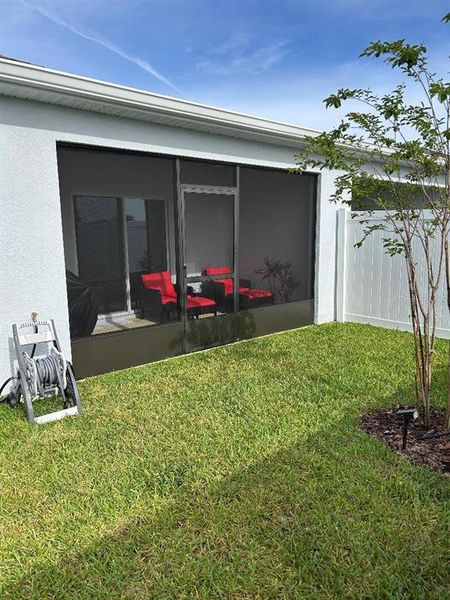 Exterior details and patio area of a home in Park Ridge Villas, Spring Hill (Image 23).