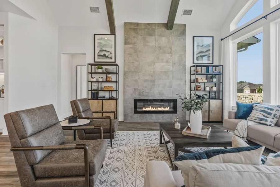 Representative furnished interior of a home built from the Mia by Chesmar Homes in Sweetwater, Austin (Image 9).