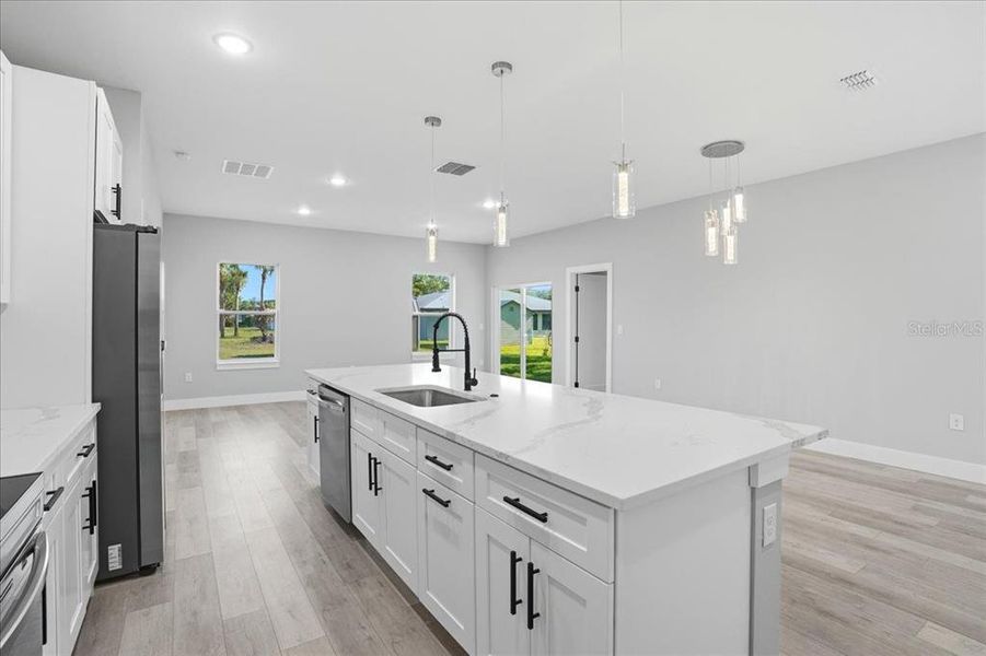 Furnished interior view inside a new home in , Port Charlotte (Image 9).