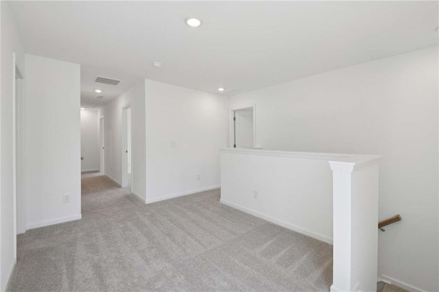 Spacious, unfurnished interior of a new home in The Pointe at Heron Bay, Locust Grove (Image 20).